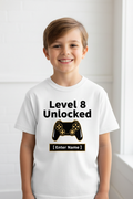 Child wearing Level 8 Unlocked minimalist birthday t-shirt in white - lifestyle